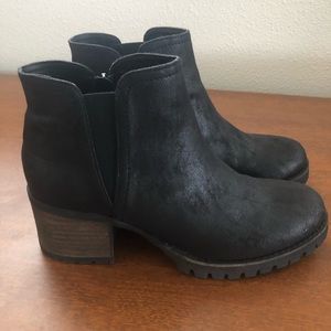 Black swayed booties